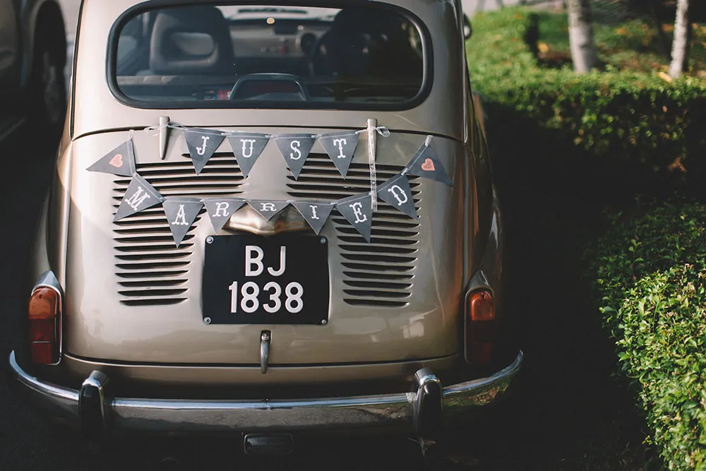 Just married, wedding car decor. Photo by Arch and Vow Studio. theweddingnotebook.com