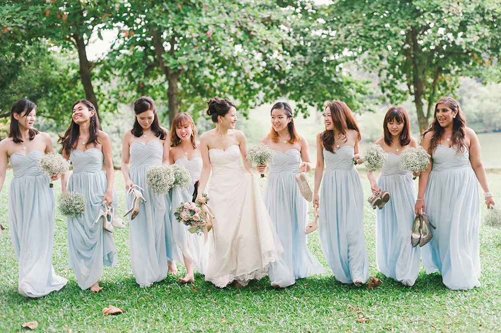 Bridesmaids in pastel blue. Munkeat Photography. theweddingnotebook.com