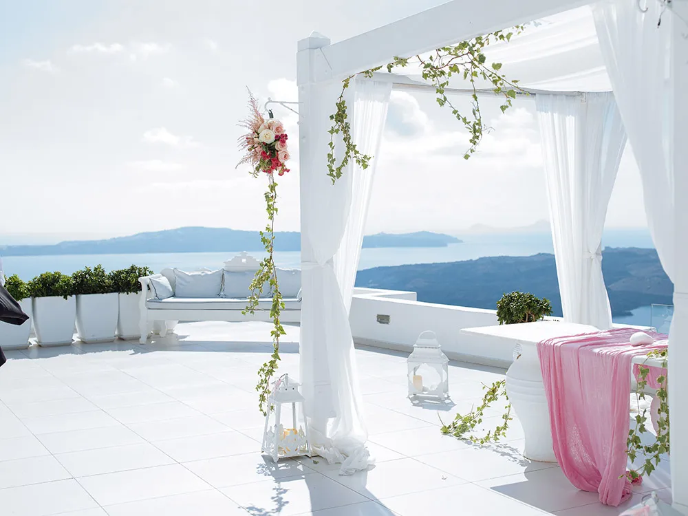 Destination wedding in Santorini. Photo by Sunrise Greece. theweddingnotebook.com