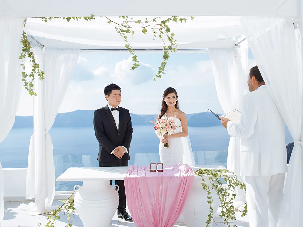 Destination wedding in Santorini. Photo by Sunrise Greece. theweddingnotebook.com