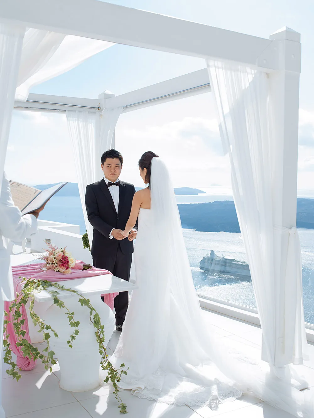 Destination wedding in Santorini. Photo by Sunrise Greece. theweddingnotebook.com