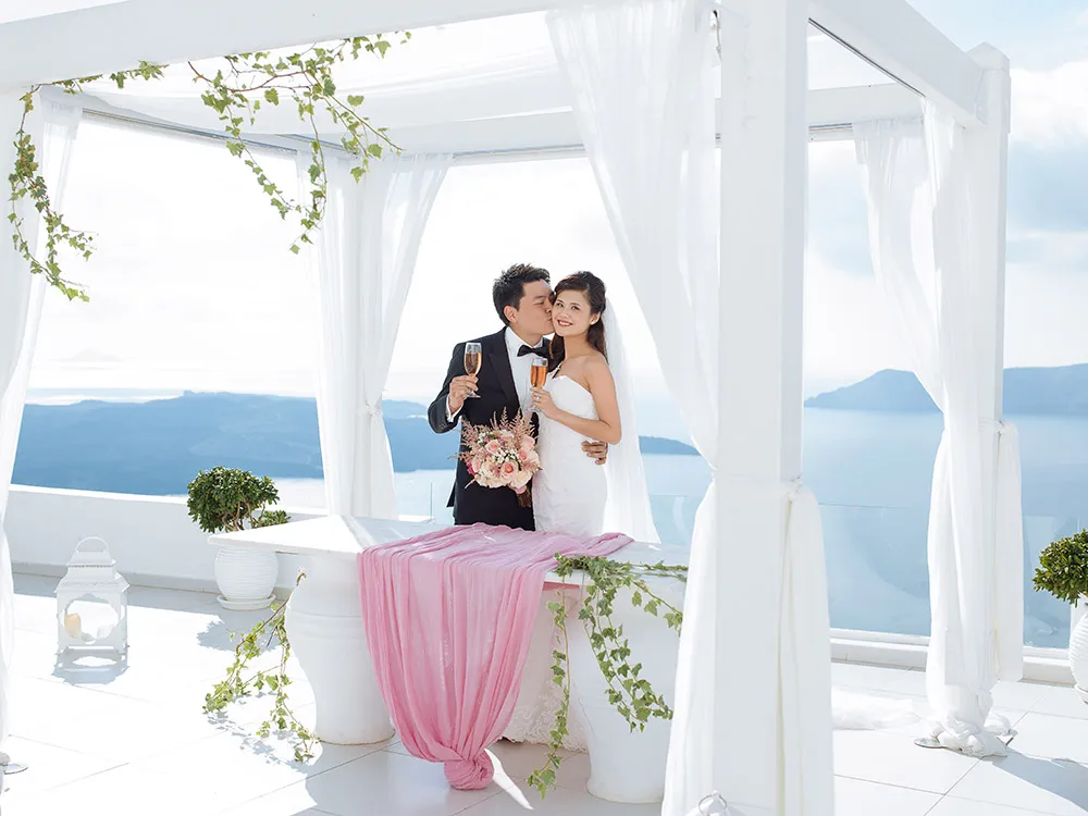 Destination wedding in Santorini. Photo by Sunrise Greece. theweddingnotebook.com