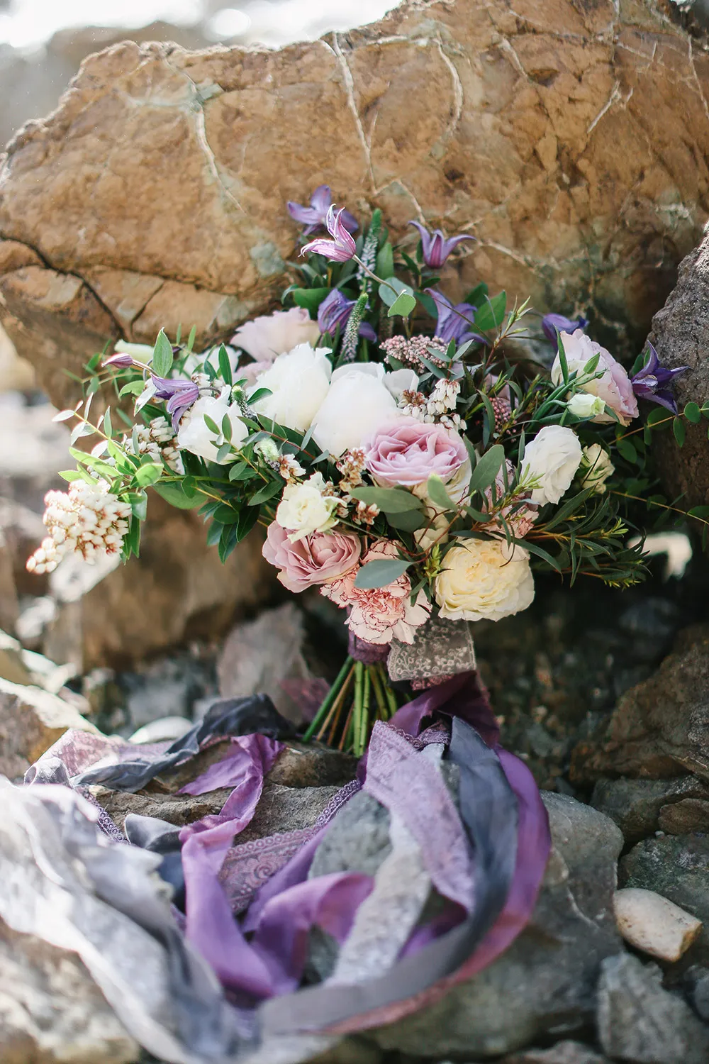 Lilac and lavender bridal bouquet. Photo by Alexander Santi. Styling by JR Weddings. theweddingnotebook.com