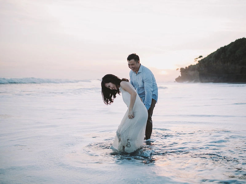 Enchanting Waterfall and Black Sand Beach Engagement Shoot in Bali