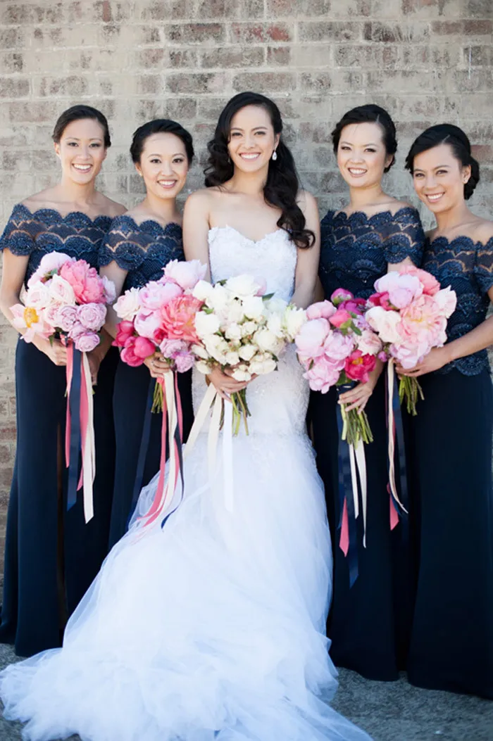 Navy blue bridesmaids' dresses. Photo by Tealily Photography. theweddingnotebook.com