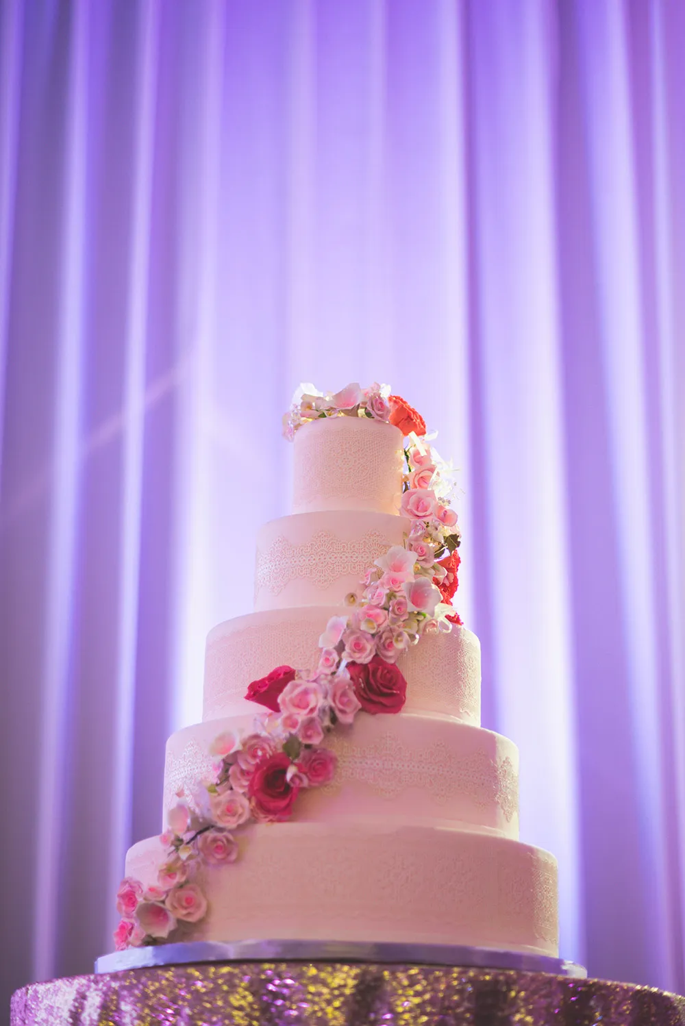 White floral wedding cake. Jon Low Photography. theweddingnotebook.com