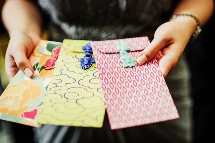 Customised DIY ang pow. Photography by Creative Clicks. theweddingnotebook.com